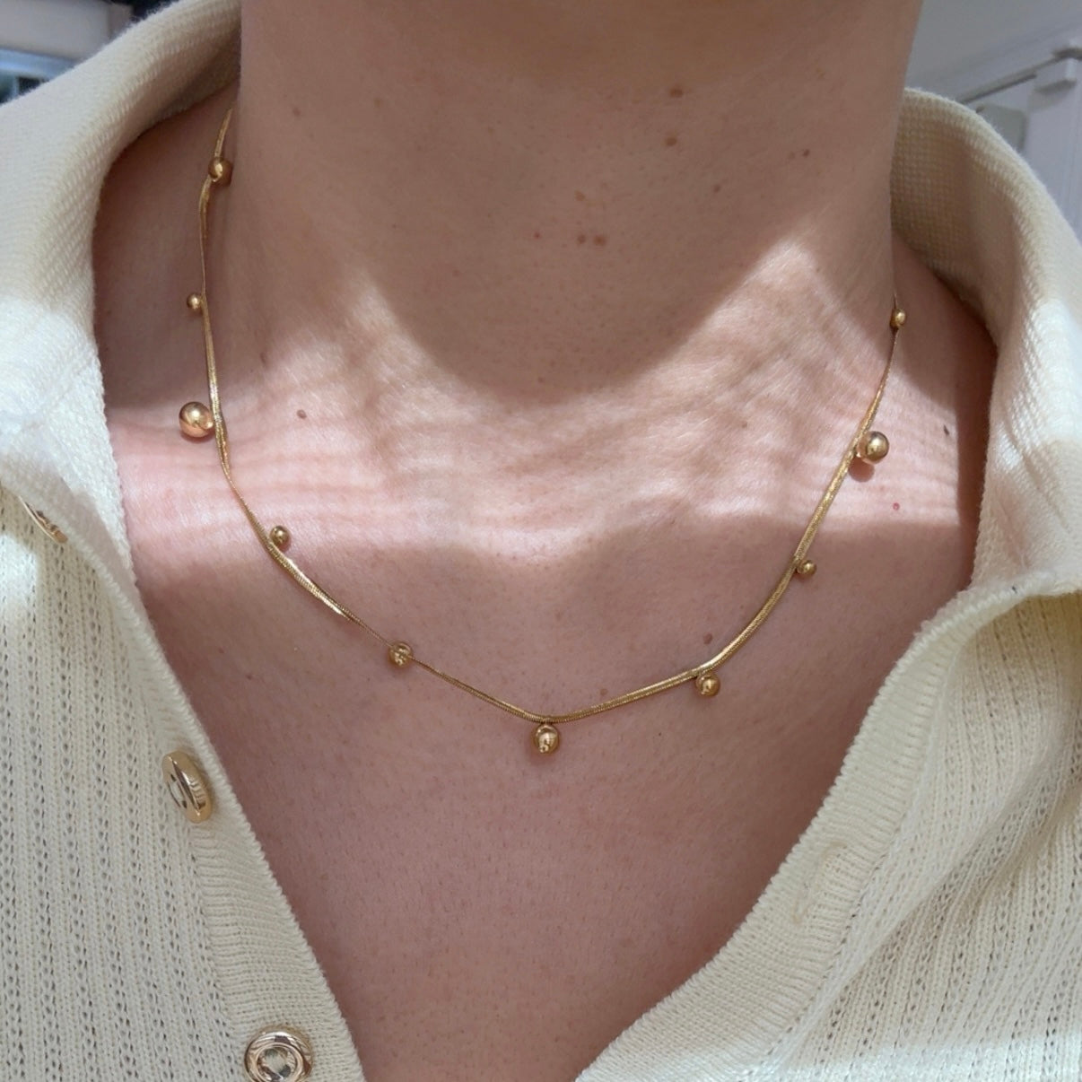 Collar Bolitas Planchado