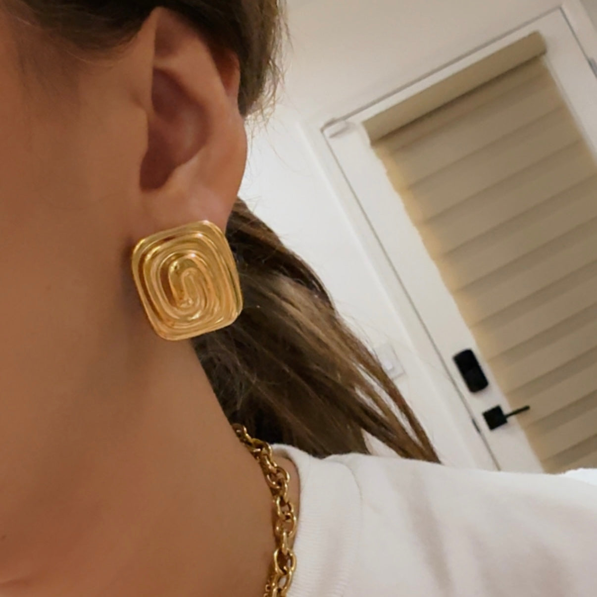 Aretes Dorados Cuadro