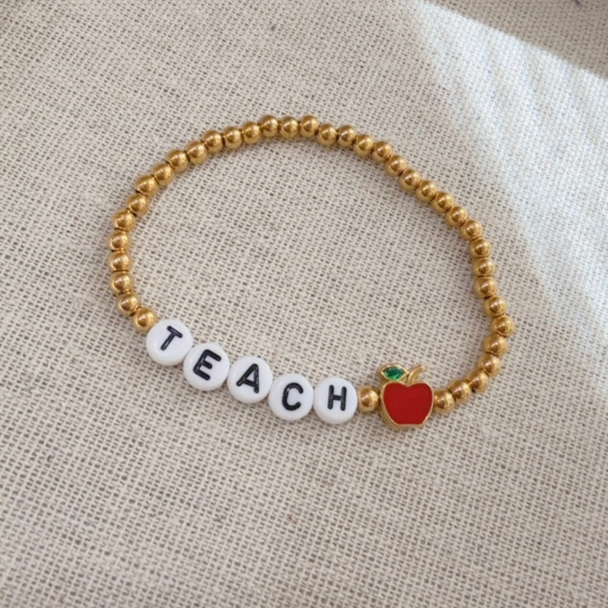 Pulsera Teach