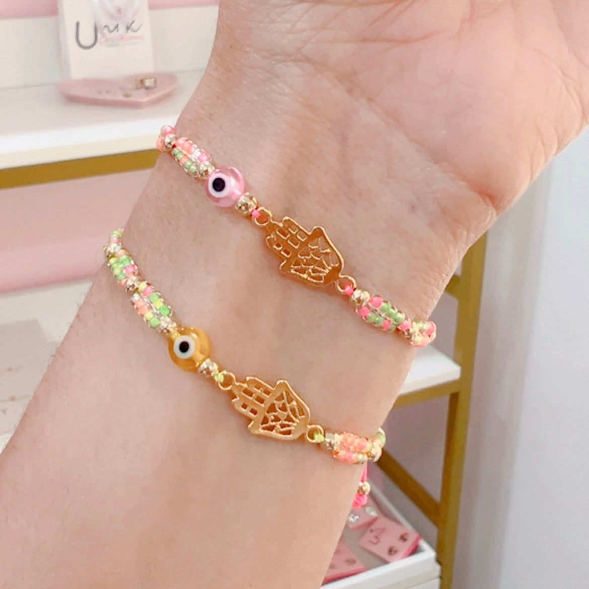 Pulsera Manita Ojito Neon