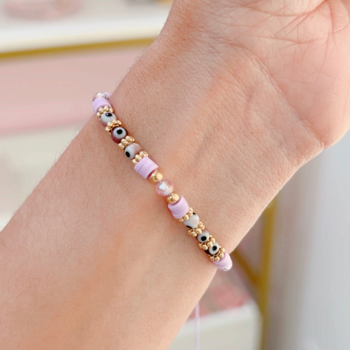 Pulsera Ojitos Cristalitos Lila